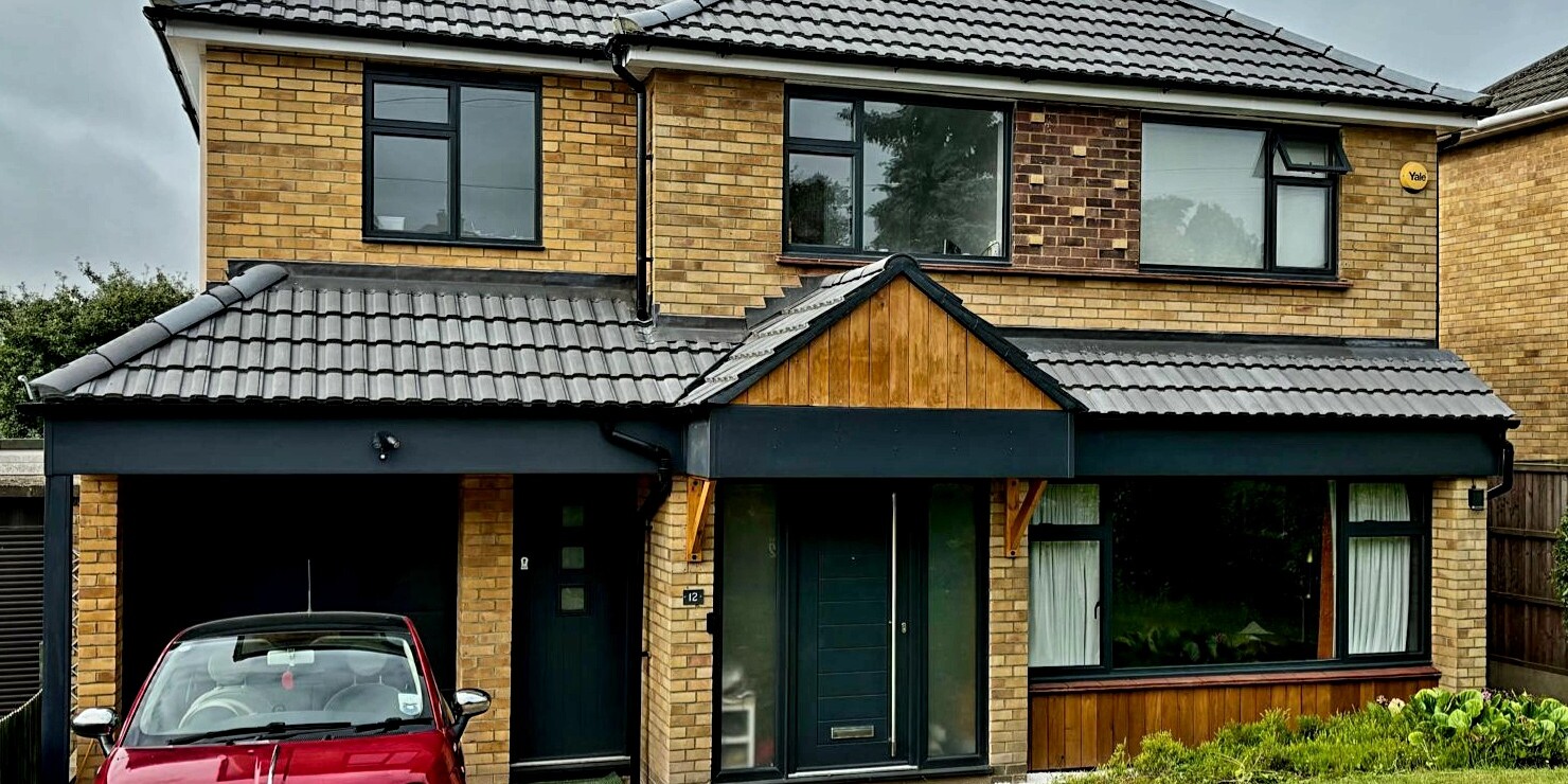 Image shows a house with a newly completed large side extension in Hitchin.