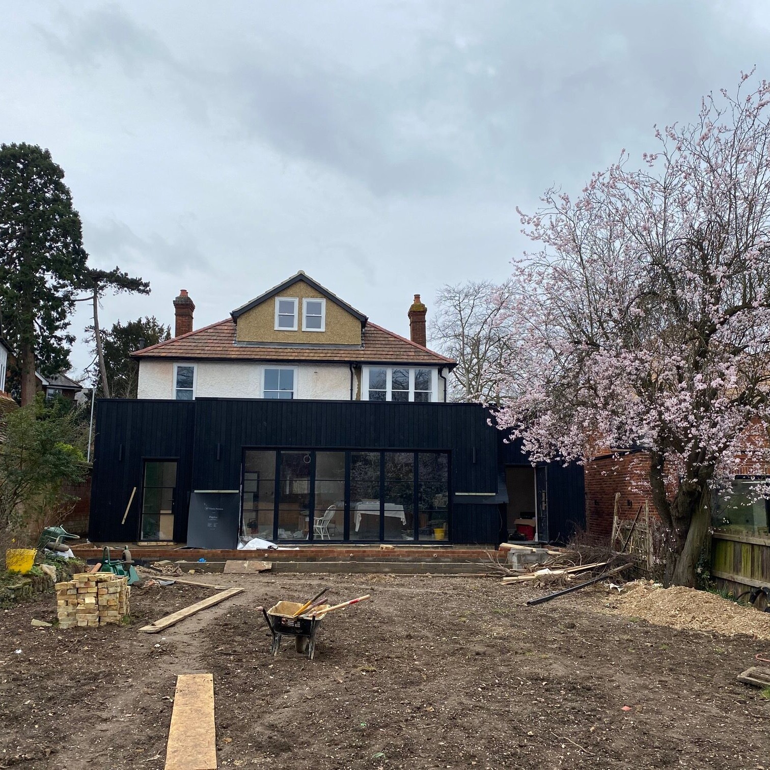 Image shows a house part way through a large ground floor extension