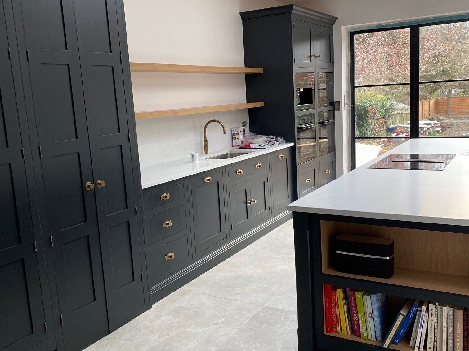 Image shows a newly fitted fitted kitchen in a house extension