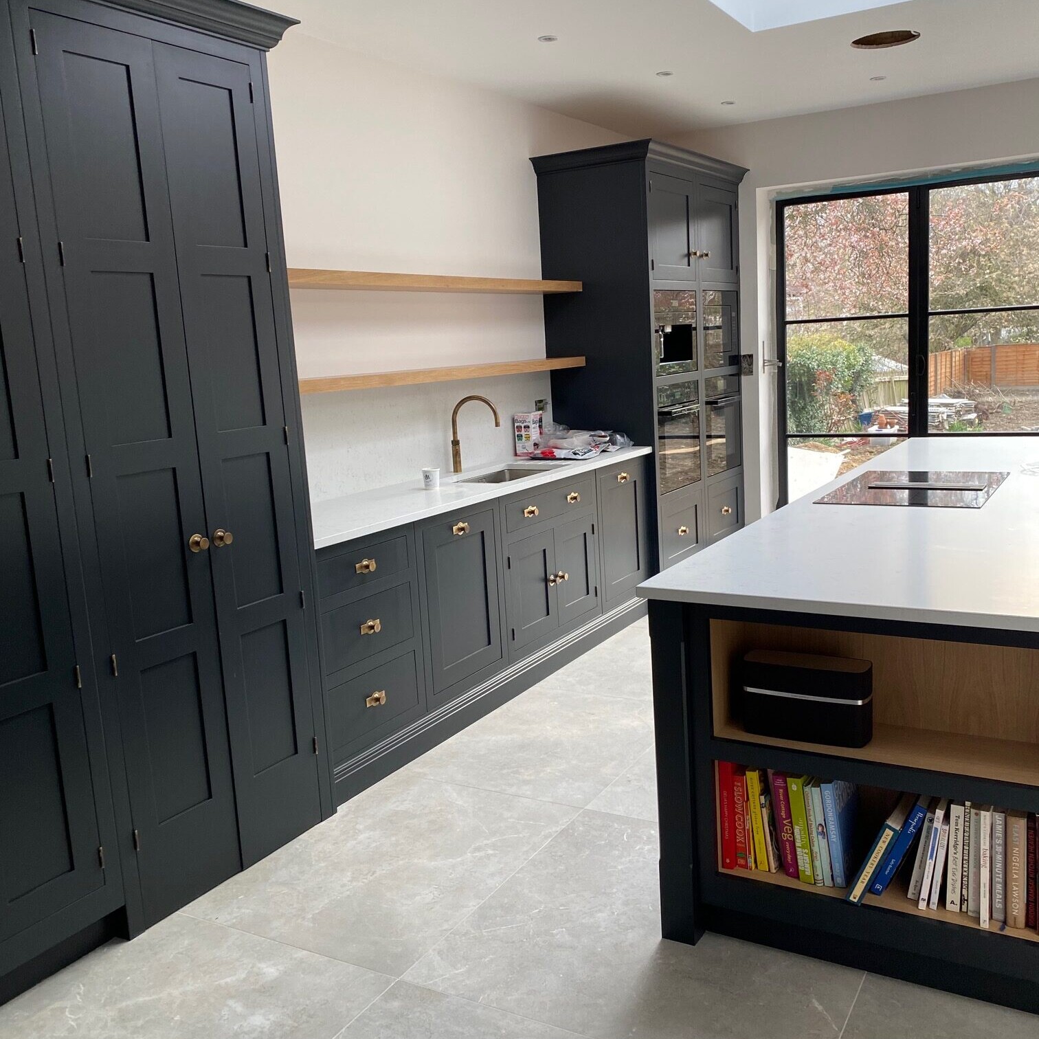 Image shows a newly fitted fitted kitchen in a house extension
