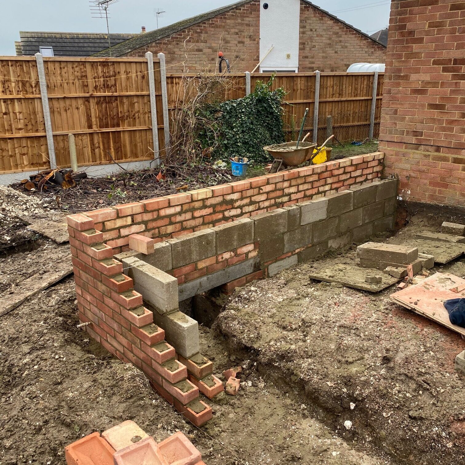 Image shows the brickwork at the start of a house extension