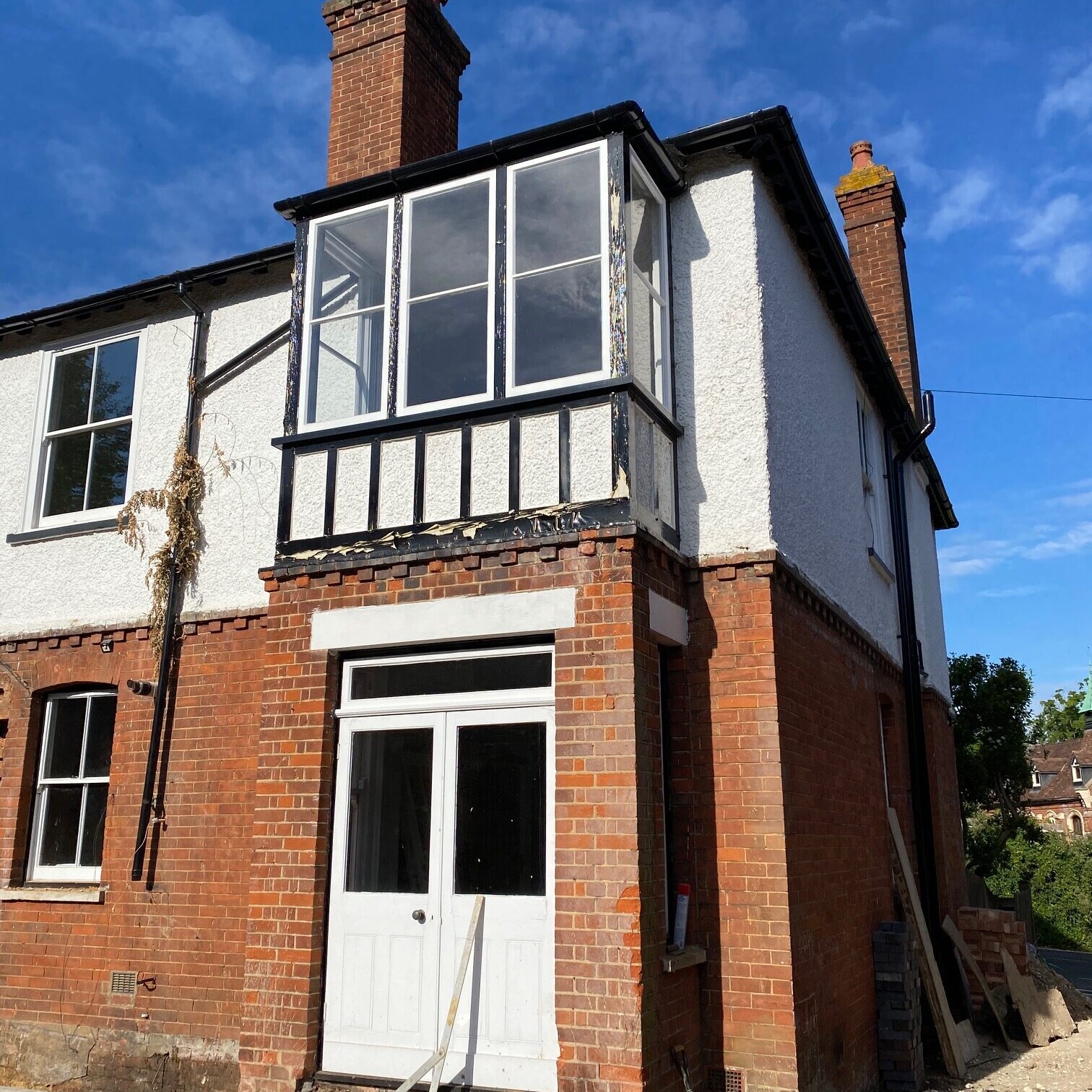 Image shows a house before an extension project was undertaken